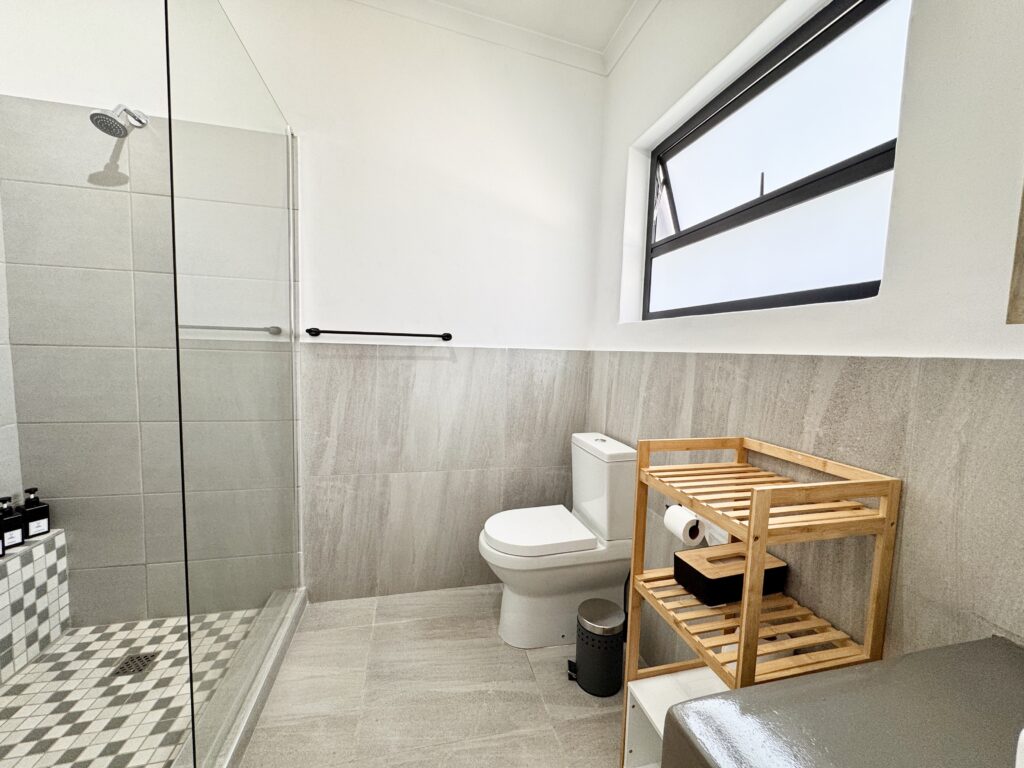 Modern bathroom with walk-in shower in Walvis Bay