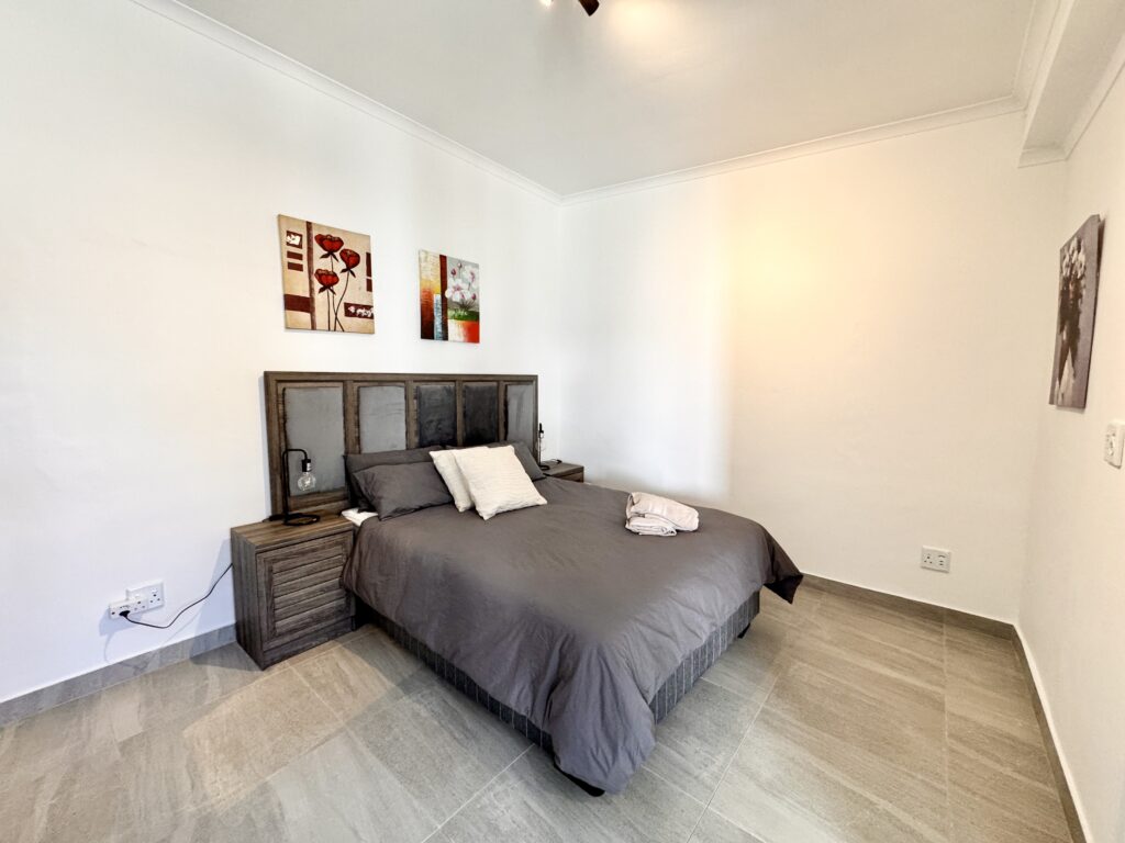 Comfortable suite bedroom at House Sworyx guesthouse